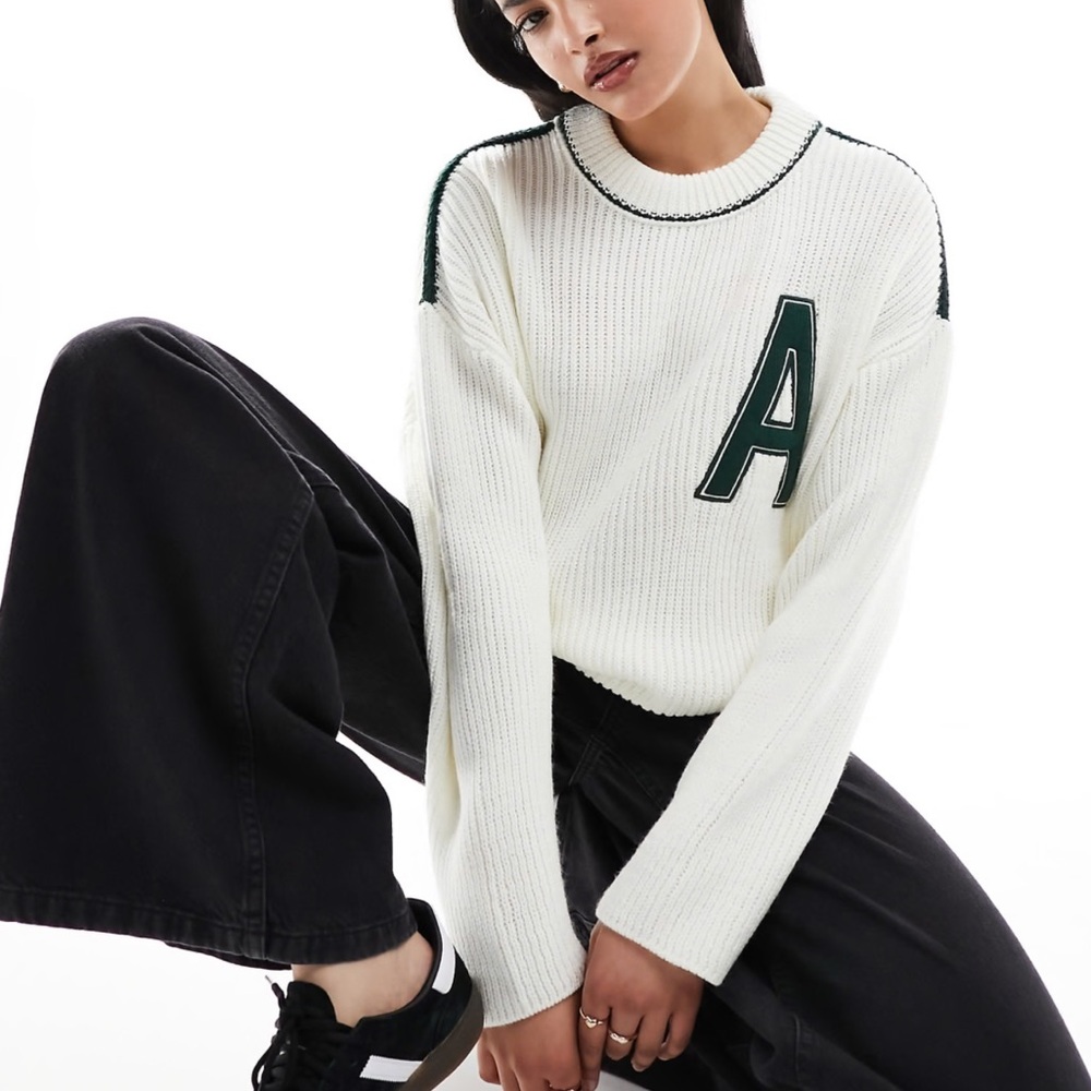 ASOS DESIGN crew neck varsity sweater in cream